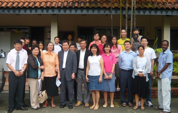 Rev and Mrs An Yo Han standing beside Matron Ivy Tow